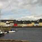 The row houses make for a colorful backdrop on the Long Walk in Galway Bay.